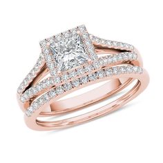 a princess cut diamond engagement ring set in yellow gold with matching wedding bands and band