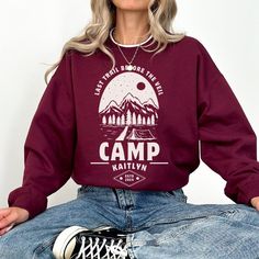 Vintage Camp Bachelorette Sweater, Camping Bachelorette Party Crewneck, Lake Bridal Shower, Retro Camp Sweatshirt, Mountain Wedding CUSTOMIZATION We love to customize! Feel free to contact me for any questions concerning personalization's or simply state your custom changes in the personalization box or in the notes section at checkout. No extra charge of course! Step back in time and embrace the vintage vibes with our Camp Bachelorette Sweater! 🏕️✨ Inspired by the rustic charm of yesteryears, this shirt brings a touch of nostalgia to your bachelorette getaway. Featuring retro fonts and a cozy, worn-in feel, it's the perfect attire for a weekend of outdoor adventure and sisterhood bonding. Let the campfires crackle, the laughter flow, and the memories last a lifetime as you celebrate love Crew Neck Winter Tops For Camping, Vintage Camping, Retro Font, Under The Stars, Outdoor Adventure, Favorite Shirts, Sew-in Labels, Sweat Shirt, Crew Neck Sweatshirt