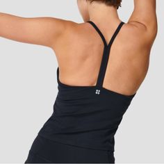 Our All-New Training Tank Top With A Super Soft Feel. Exclusive Sweaty Betty Fabric Is Supportive, Breathable, Sweat-Wicking And 90% Squat Proof. Slim Fit With Back Detailing. Light Support In-Built Bra Style Code: Sb6553 Brand New With Tags, No Cups. Black Seamless Tops For Pilates, Seamless Black Tops For Pilates, Functional Tops With Built-in Bra, Black Elastane Tops For Pilates, Functional Black Top With Built-in Bra, Gym Tops With Built-in Bra And Minimal Stretch, Functional Bra Friendly Black Tops, Elastane Tops For Pilates, Black Tops With 4-way Stretch For Pilates