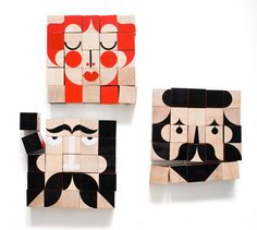 three wooden blocks with faces and mustaches on them, one is made out of wood