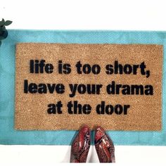 a door mat that says life is too short, leave your drama at the door