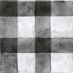 a black and white checkered rug is shown in the middle of an image with no one on it