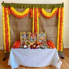 a table with decorations on it and the words poja decoration ideas above it for diwaling