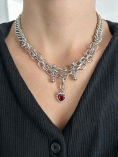 This handmade chunky silver chain necklace is made with silver stainless steel chain and is adjustable with a lobster clasp closure. Each chain is connected in the back, making this layered necklace one piece.  It contains the following -  stainless steel chain red glass rhinestone heart charm piercing connector 14 inches in length, adjustable to 16 inches with a lobster clasp closure **Each necklace comes in a cloth bag, a cleansing cloth, and an anti-tarnish tab to help prolong the life of your jewelry This layered edgy piece will make any outfit look cool and stand out. It fits perfectly with your aesthetic outfits, baddie aesthetic looks, and has an alternative Y2K 2000s design. 'That girl' and 'clean girl,' style and super versatile, this necklace will turn heads, even while paired wi Chunky Silver Chain Necklace, Edgy Streetwear, Goth Accessories, Layered Chain, Silver Choker Necklace, Necklace Red, Layered Chains, Silver Choker, Cloth Bag