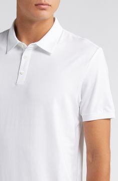 This polished take on the polo is crafted from lightweight lyocell jersey with added stretch to retain its shape. 26" length (size medium) Button half-placket Spread collar Short sleeves 93% Tencel® lyocell, 7% spandex Tencel lyocell is a sustainably produced fiber made with closed-loop processing Dry clean or machine wash, tumble dry Imported Classic Collared Polo Shirt With 4-way Stretch, Classic Cotton Polo Collar T-shirt, White 4-way Stretch Polo Shirt, Classic Polo Collar T-shirt With Button Closure, Moisture-wicking 4-way Stretch Short Sleeve Polo Shirt, Short Sleeves, Nordstrom, Collar