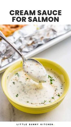 a spoon full of cream sauce in a yellow bowl with the title text above it