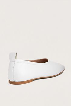 An elegant, architectural ballet flat that feels as good as it looks. Designed for everyday wear, these slip-on shoes are cut, sewn and crafted by hand from supple LWG Gold-certified leather and their shape is defined by the natural curve of the foot. The directional squared toe and flattering vamp give the humble ballet flat a simple yet modern update. DETAILS Colour: White Squared toe Slip-on Memory foam padding for extra comfort Leather lining and insole Heel height: 5mm / 0.2in Handmade in I Leather Ballet Flats, White Flats, Ballet Flat, Leather Flats, Luxury Shoes, Shoe Brands, White Leather, Slip On Shoes, Ballet Flats