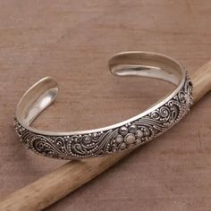 Sterling Silver Swirl Motif Cuff Bracelet from Bali - Shrine Swirls | NOVICA Luxury Carved Bracelets For Wedding, Luxury Carved Antique Silver Jewelry, Luxury Handmade Ornate Sterling Silver Bracelet, Beautiful Bracelet Novica, Luxury Antique Silver Bracelets With Intricate Design, Luxury Handmade Antique Sterling Silver Bracelet, Luxury Antique Silver Artisan Jewelry, Luxury Elegant Antique Silver Sterling Bracelet, Sterling Silver Bracelets Novica