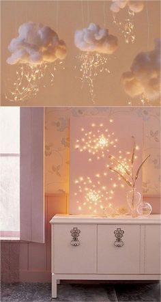 the clouds are hanging from the ceiling above the dresser in this room, and it looks like they have been made with string lights