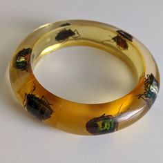 Vintage Amazing Piece . Fits A 6 To 6.5 Inch Wrist Best Gorgeous Acrylic/ Lucite Vintage Genuine Beetle Bangle . Preserved Real Beetles That Are Amazing And Show Beautiful Green And Blue Iridescent Coloration. This Is A Beautiful Beautiful Translucent Piece. Hard To Come By Firm . Priced Reasonably. Hot 1960s Item! Please Ask Any Questions Thanks! Bug Ring, Bug Beetle, Desired Reality, Beautiful Beautiful, Chunky Jewelry, Pretty Green, Beetles, Vintage Yellow, Green And Blue