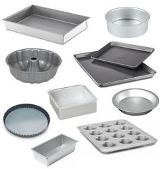 an assortment of baking supplies including cake pans, muffin tins and other items