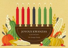 a jewish holiday card with candles in a bowl surrounded by autumn fruits and veggies