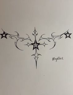 an artistic tattoo design with stars on it