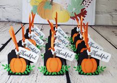 there are many place cards with pumpkins on them