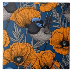 a blue and orange floral pattern with birds on it's back ground, in front of a dark blue background