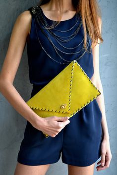 "Soft Symmetria Clutch in yellow. The perfect bag for all occasions! Ideal for cocktail and parties or for business meetings depending the size you choose. You can use it as a chic briefcase for your work or as a modern large clutch for a night out. This adorable large clutch is handmade out of a genuine, lux Italian yellow suede leather. -Small size fits all your essentials, wallet, keys, mobile, cosmetics etc. -Large size fits a 15\" laptop, ipad, portofolio etc and it's perfect as a file fold Chic Yellow Rectangular Clutch, Chic Yellow Clutch For Formal Occasions, Chic Yellow Clutch As A Gift, Chic Yellow Clutch For Gift, Chic Yellow Clutch As Gift, Yellow Rectangular Clutch As Gift, Yellow Rectangular Clutch For Gift, Elegant Yellow Pouch Clutch, Yellow Elegant Clutch For Formal Occasions