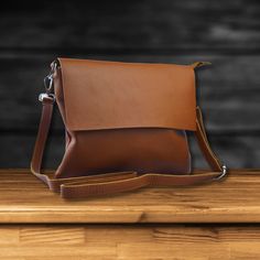 Elevate your style with our premium leather crossbody bag. This versatile, handcrafted bag is perfect for any occasion, from festivals to everyday use. Product Details: ✅ Made from high-quality, leather ✅ Dimensions: L 26cm, W 3cm, H 21.5cm, Strap Length: 90cm ✅ Adjustable strap for a comfortable fit ✅ Back zip pocket for added security ✅ Suitable for women and men as a stylish and practical accessory Perfect for: ✅ Crossbody phone bag ✅ Camera bag ✅ Small tote bag ✅ Shoulder bag ✅ Purse ✅ Festi Leather Flap Bag With Smooth Grain For Daily Use, Everyday Satchel Flap Bag With Smooth Grain, Brown Flap Bag With Smooth Grain For Daily Use, Daily Use Leather Flap Bag With Smooth Grain, Daily Use Crossbody Saddle Bag With Smooth Grain, Daily Crossbody Saddle Bag With Smooth Grain, Leather Flap Clutch Bag, Leather Crossbody Clutch For Daily Use, Leather Travel Clutch Flap Bag