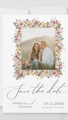 a wedding save the date card with an image of two people and flowers on it