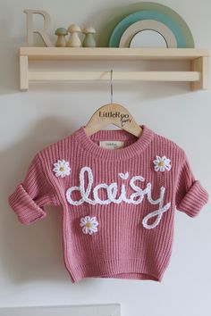 🤍 The perfect personalised sweater for your little love or a fantastic personalised gift  🤍 100% handmade designs with care and attention put into every sweater. Choose personalised wording or name with the optional addition of flowers, hearts or bumblebees. Message if you would like such additions 🤍 Colours may vary slightly due to screen settings and lighting. 🤍 Care Instructions - Turn the sweater inside out and Machine Wash or Hand Wash. Air Dry Naturally. Shipping  *Please note that the Customizable Cute Crew Neck Sweater, Cute Customizable Crew Neck Sweater, Personalized Cotton Sweater For Winter, Personalized Cute Crew Neck Sweater, Personalized Pink Crew Neck Sweater, Personalized Pink Long Sleeve Sweater, Cute Pink Letter Print Sweater, Customizable Long Sleeve Sweater For Gift, Cute Pink Sweater With Letter Print