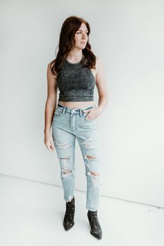 Look your best in Stacy's Mom Jeans! These high-waisted rigid mom jeans feature a flattering silhouette with distressed detailing at the back. The 11" rise and 27" inseam have been modeled in size 3/25 to ensure a perfect fit. Set the trend and make a statement in Stacy's Mom Jeans! Distressed Mid-rise Mom Jeans, Stacys Mom, Wallet Bag, Sweater Blouse, Cropped Tank Top, Boot Sandals, Jeans Dress, Bag Straps, Jean Shorts