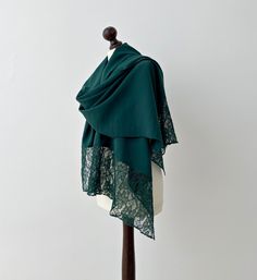 "Discover our exquisite collection of green scarves and shawls, perfect for adding a touch of elegance to any outfit. This emerald green pashmina scarf with elegant lace will elevate your look with its rich color. A forest green lacy shawl is a beautiful choice for a more feminine and sophisticated look. Our bridal oversized scarf is the perfect accessory for a special occasion, making it an ideal gift for the bride's mother. A versatile wrap that exudes style and charm, our boho evening pashmin Green Scarves, Lacy Shawl, Bridal Wrap, Boho Scarfs, Shawl Knitting Patterns, Hand Dyed Wool, Green Scarf, Wedding Wraps, Bridal Event