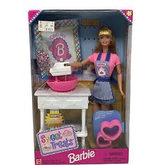 the barbie doll is cooking in her kitchen