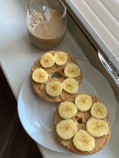 two pieces of bread with banana slices on them