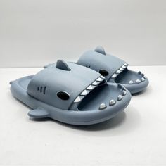 A Super Fun Pair Of Light Gray Shark Slides. New With Tags And The Original Bag Is Also Available. Please See All Pictures And Ask Questions If You Need Clarification. Size Is 38-39 (Usually An 8/9) I Shoes. Keywords: Slides, Sandals, Sharks, Fun, Summer Shark Slides, Slides Sandals, Original Bags, Fun Summer, Sharks, All Pictures, Women's Shoes Sandals, Light Gray, Shoes Sandals