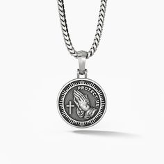 This St Christopher pendant depicts the legendary story of the patron saint of travelers, carrying a child, later to reveal himself as Jesus Christ, across a mighty river, despite his weight becoming almost unbearably heavy. Through his immense effort, Saint Christopher delivered the child safely, and his service pleased Christ. We hope it serves you as an amulet of protection, wherever your path leads. Our silver mens St Christopher necklace is crafted in impeccable detail and will be a constan Saint Christopher Necklace, Mens Silver Pendants, St Christopher Necklace, St Christopher Pendant, St Christopher, Saint Christopher, Christian Jewelry, Amulets, Patron Saints