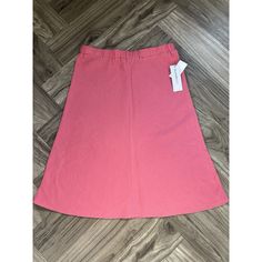 This Liz Claiborne Midi Skirt In Pink Is Perfect For A Casual Summer Occasion. The Skirt Is Made Of A Blend Of Rayon And Linen, And Features A Solid Pattern With A Flare Style. It Has A Pull-On Closure And Is Lined For Comfort. The Skirt Is A Size M And Is Suitable For Regular Size Women. The Barbie Character Can Be Seen In The Design, Making It A Great Addition To Any Barbiecore Or Girly Wardrobe. Casual Midi Skort For Spring, Casual Spring Midi Skort, Pink Stretch Skirt With Elastic Waistband, Knee-length Cotton Skort For Spring, Pink Stretch Skirt With Pockets, Casual Knee-length Skort For Spring, Casual Pink Knee-length Bottoms, Casual Long Pink Skirt, Casual Pink Flared Skirt