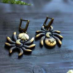 Gold Whimsical Polymer Clay Earrings, Whimsical Gold Polymer Clay Earrings, Gold Fantasy Jewelry For Halloween, Fantasy Brass Jewelry For Gifts, Handmade Resin Jewelry For Halloween, Handmade Black Fantasy Earrings, Bronze Gothic Jewelry For Gift, Themed Gold Earrings For Gifts, Fantasy Earrings For Halloween Gift