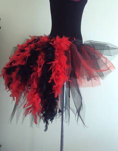 a red and black tutu skirt on a mannequin