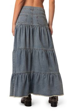 Draw inspiration from the folk-inspired outfits of the late '90s in a tiered denim maxi skirt designed with a low-slung waist and a softly frayed hemline. Zip fly with button closure Five-pocket style 100% cotton Machine wash, line dry Imported Skirt Tiered, Visionary Fashion, Long Denim Skirt, Cute Crop Top, Denim Maxi, Summer Getaway, Denim Maxi Skirt, Swimwear Dress, Cute Crop Tops