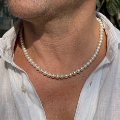 Discover the privilege that perfect mens pearl necklaces for modern people will create in your style. You can find these necklaces only in our store. Just for you!  Features of the necklace: - Pearl size: 6 mm  - Pearl color: White - Clasps:  Silver Lobster Clasp - Necklace size: Sizes now available in 18"(46 cm), 19"(48 cm), 20"(51 cm), 21"(53 cm), 22"(56 cm) and 23"(58 cm) necklaces. You may choose extra chain extension (2 inches - 5 cm) - Design code: MN0035 👉SIMPLY MESSAGE US FOR CUSTOM LEN Pearl Chain For Men, Pearl Necklaces Men, Pearl For Men, Pearls On Men, Pearl Men Necklace, Guy Pearl Necklace Aesthetic, Pearl Necklaces, Man Pearl Necklace, Guys Pearl Necklace