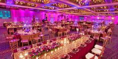 a large banquet hall with tables and chairs