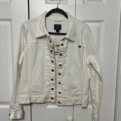 White Denim Jacket By Lucky Brand With Some Stretch, Snaps And No Chest Pockets. The Jacket Is Not Bright White, It Is A Little Bit Off White. I Have It Pictured Against A White Door To See The Difference. White Denim Jacket With Buttons, Casual White Utility Jacket With Button Closure, White Casual Utility Jacket With Relaxed Fit, Casual White Utility Jacket With Relaxed Fit, White Casual Utility Jacket For Work, White Casual Denim Jacket With Button Closure, White Casual Cotton Utility Jacket, Casual White Denim Jacket With Button Closure, Casual White Cotton Utility Jacket