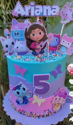 a birthday cake with an image of dora the cat and other animals on it's top