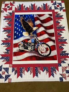 an american flag quilt with a motorcycle on the front and eagle on the back, as well as stars and stripes