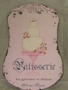 a sign with a cake on it that says battisserie, for guests of delight