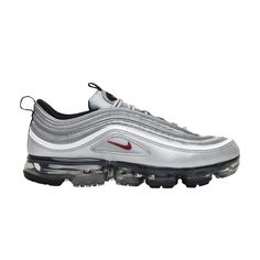 Find NIKE Air Vapormax 97 ' Bullet on Editorialist. The Nike Air VaporMax 97 ‘Silver Bullet’ is the physical manifestation of ‘old meets new.’ The upper is borrowed from the iconic OG colorway of the Air Max 97, the shoe that introduced full-length visible Air to the world. The debut was accompanied by an ostentatious silver finish on the upper, reproduced here with period-correct details like the red mini-Swoosh and black nylon pull loops. The promise of full Air cushioning is achieved with the addition of Nike’s VaporMax platform underfoot. Silver Bullet, Air Vapormax, Mens Nike Air, Nike Air Vapormax, The Promise, Black Nylon, Black Nylons, Men's Nike, To The World