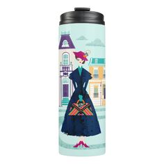 a water bottle with an image of a woman in a blue dress