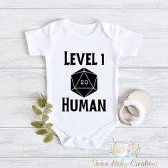 Introducing our adorable collection of baby bodysuits and toddler shirts! These charming and comfortable garments are perfect for your little ones to rock in style and comfort. Each piece is carefully crafted with love and attention to detail to ensure a delightful experience for both parent and child. 🌟 Key Features: 💜Superior softness: Made from premium, high-quality fabrics, our baby bodysuits and toddler shirts are incredibly soft and gentle on delicate skin. Your little bundle of joy will Playful Cotton Bodysuit As A Gift, White Short Sleeve Bodysuit With Letter Print For Playtime, Playful Cotton Onesie For First Birthday, Funny Customizable Cotton Onesie, Cotton Bodysuit With Letter Print For Playtime, White Cotton Short Sleeve Bodysuit For Playtime, Family Matching Cotton Onesie For Birthday, Birthday Cotton Onesie With Graphic Print, White Cotton Onesie As A Gift