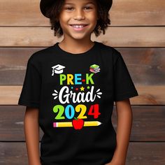 Celebrate your little one's graduation from Pre K in style with our 2024 Preschool Grad Shirt! This adorable t-shirt is perfect for both boys and girls, featuring a custom design with your child's graduation year prominently displayed.  Whether your child is graduating from preschool or kindergarten, this shirt is a great way to commemorate this special milestone in their educational journey.  Our graduation t-shirt is also a great gift idea for friends and family with young graduates. Available Prek Graduation, Grad Shirts, Pre K Graduation, Kids Graduation, Graduation Year, Boy Girl, Mother’s Day, Sweater Hoodie, Kids Tshirts