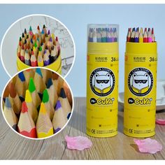 several different colored pencils are shown next to each other and one is in a cup