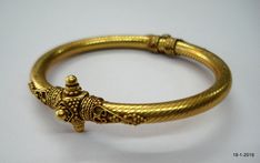 "sterling silver gold vermeil gold gilded Bangle Bracelet from Rajasthan India. great handmade design good for jewelry collection. Note - Please check pictures carefully for more detail. Inner diameter side to side - 5.8 cm(2.28\") Inner circumference - 17 cm (6.7\") width max. - 7 mm weight - 20 grams Material - sterling silver gold plate on top." Antique Gold Bangle For Gift, Yellow Gold Brass Bangle With Intricate Design, Gold Ornate Brass Cuff Bracelet, Formal Gold Byzantine Bracelets, Ornate Gold Brass Bangle, Yellow Gold Byzantine Bangle Bracelet, Yellow Gold Byzantine Wedding Bracelets, Byzantine Style Wedding Bracelet Jewelry, Gold Byzantine Bangle Bracelets