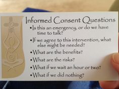 someone is holding up a card with an informational question on it in their hand