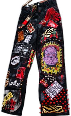 Alternative Style Graphic Print Streetwear Pants, Alternative Graphic Print Pants For Streetwear, Distressed Punk Jeans For Festivals, Punk Halloween Jeans For Streetwear, Punk Jeans For Halloween Streetwear, Edgy Halloween Streetwear Jeans, Punk Style Cotton Jeans For Festivals, Halloween Streetwear Cotton Jeans, Halloween Cotton Jeans For Streetwear