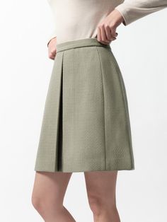 Composition : 60% polyester / 25% acrylic / 15% rayonCountry of Origin : Republic of Korea Elegant Pleated Skort For Winter, Elegant Pleated Winter Skort, Elegant Winter Skort With Lined Skirt, Elegant Winter Lined Skort, Elegant Short Green Skirt, Chic Green Pleated Workwear Skirt, Chic Green Pleated Skirt For Work, Chic Green Pleated Skirt For Fall, Green Short Skirt For Fall