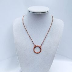 This copper necklace features a large hand forged link centered on a raw copper chain. Each pendant is individually sawn, shaped and given a hammered-in texture. The piece is then reshaped, smoothed with fine steel wool and polished with an extremely fine sand paper to bring out the texture and smooth the seam. It's available in a variety of sizes for the same price. It is made to order. If you don't see the length you desire select 00 inches and include the size you want on your invoice. This n Hand Forged Copper Necklace In Rose Gold, Hammered Bronze Copper Necklace, Soldered Copper Rose Gold Necklace, Bronze Hammered Copper Necklace, Hand Forged Rose Gold Copper Necklace, Rose Gold Soldered Copper Necklaces, Rose Gold Soldered Copper Necklace, Rust Colored Hammered Copper Jewelry, Hammered Rose Gold Copper Jewelry