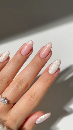 Pearl nails, pearl nail inspo, classy nails, simple nail art, french nails, easy nail art, nail inspo, nail trends 2023, almond nails, long nail inspiration, pearly nail art, pearl nail polish, trendy nails, white nails, nails for winter, winter nail art, summer nail art, spring nail art, everyday nails, gel nails, nude nails, subtle nail art, xmas nails, christmas nails, holiday nails, winter nails, nail art inspo, white nails, bride nails, wedding nails, bridal nails Nail Ideas Almond Shape Winter, Nail Art Designs Wedding Guest, Classy Nails Wedding Guest, Wedding Nails Pearl Brides, Winter Fairy Nails, White Gel Nail Ideas, White Nails Bride, Pearl Swirl Nails, Simple Pearl Nails